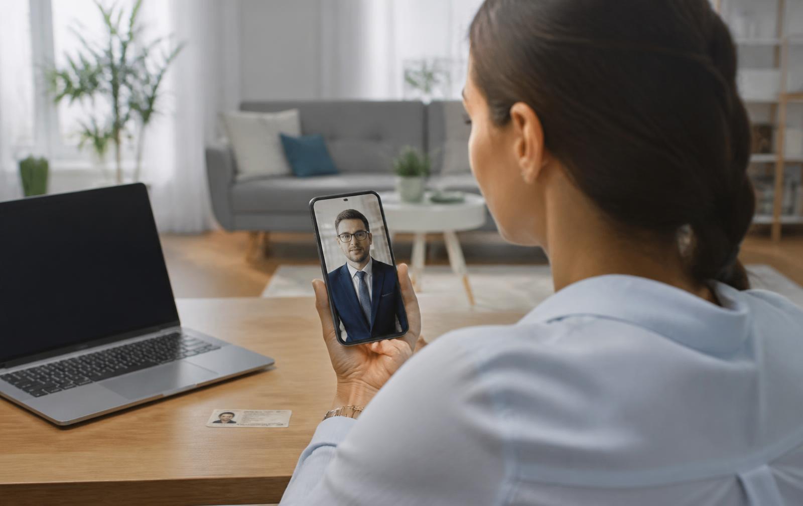 Customer completing Video KYC account opening with a ShoreCreditCorp officer